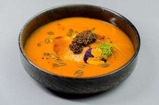 Creamy Pumpkin Soup with Submerged Toasts and Caviar