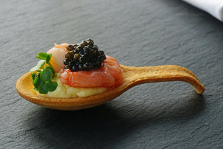 Edible spoons with egg mousse, king prawn and caviar