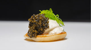 Mini Blini with Cream Cheese With Herbs and Caviar