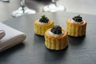Vol-au-vent with whipped cream cheese and caviar